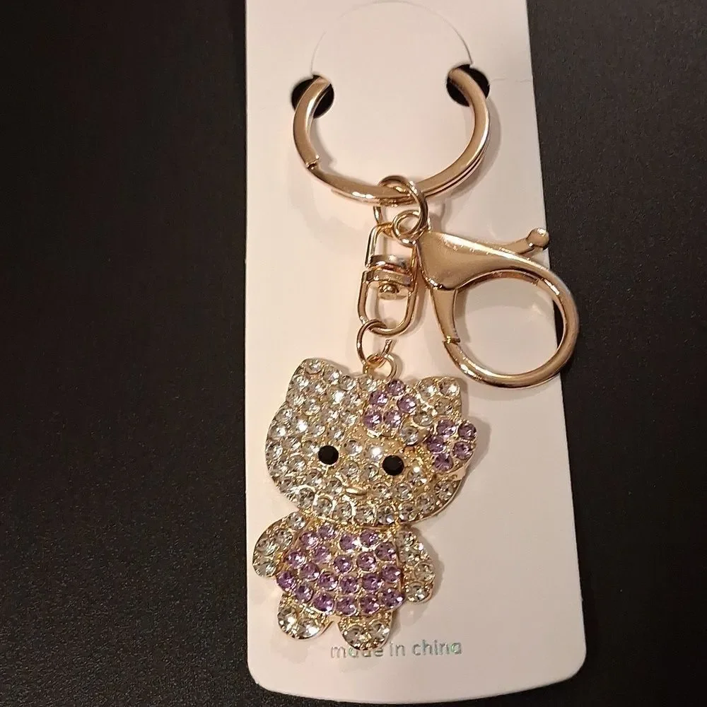 Hello Kitty Purple And White Rhinestone Keychain With Goldhardware. New In Packa